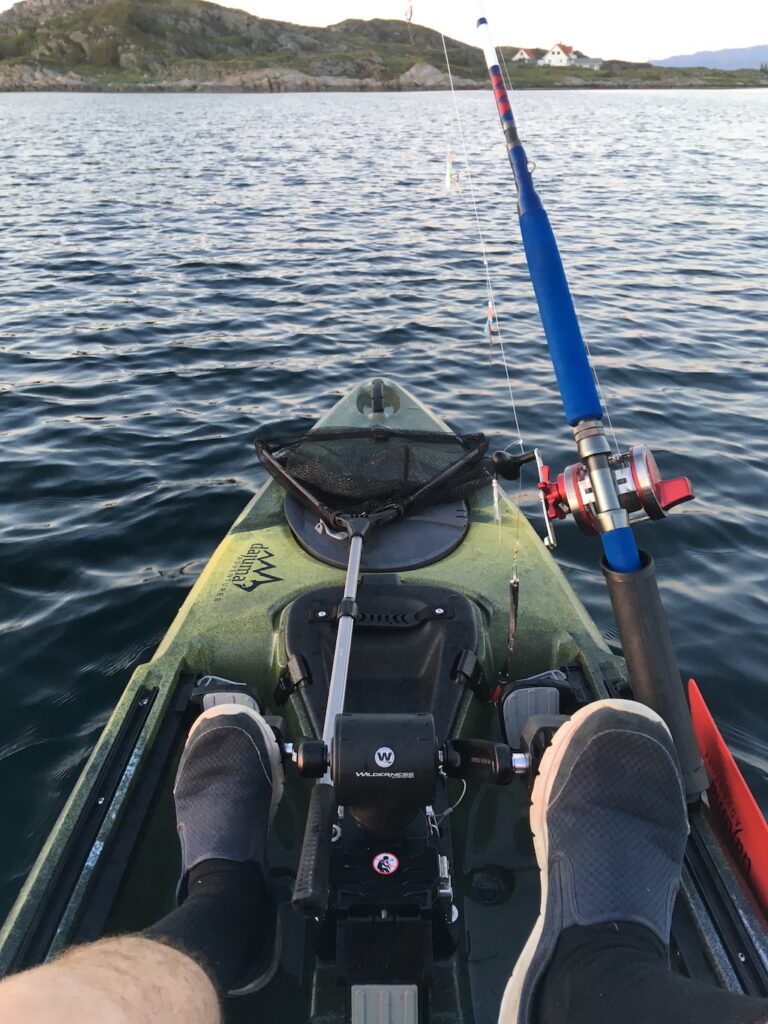 Kayak with fishing rod at Lyso, Norway